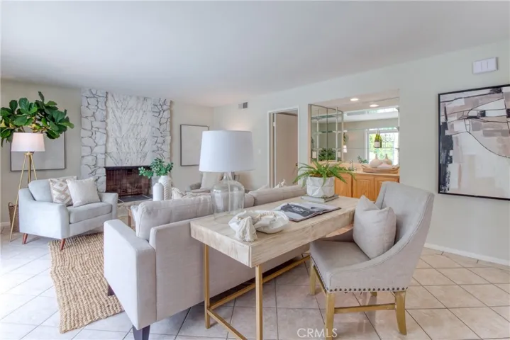 Cozy up around the fireplace in the family room!