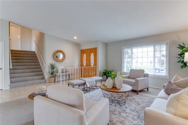 Living Room with smooth ceilings and a fresh neutral interior paint color to match any decor~
