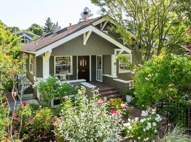 lots of roses,brick path,wide porch