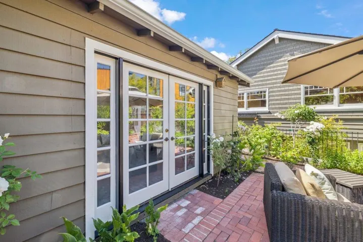 French doors in garage - use for workout/recreation , etc.Alley access