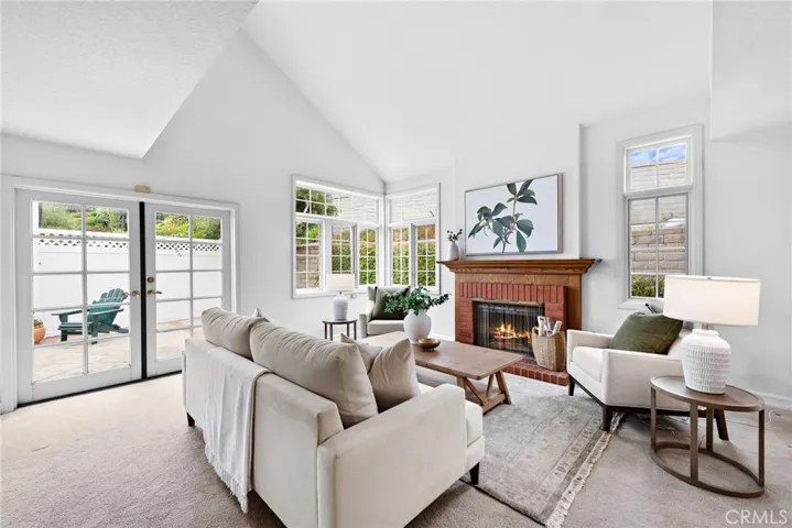 Bright & open Living room with lots of windows & high ceilings.