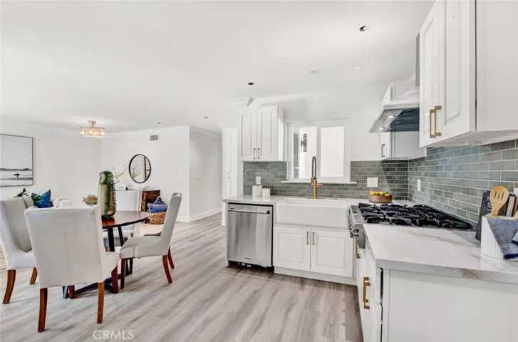 Gorgeous Chef’s Kitchen with Quartz Countertops Views to the Backyard!