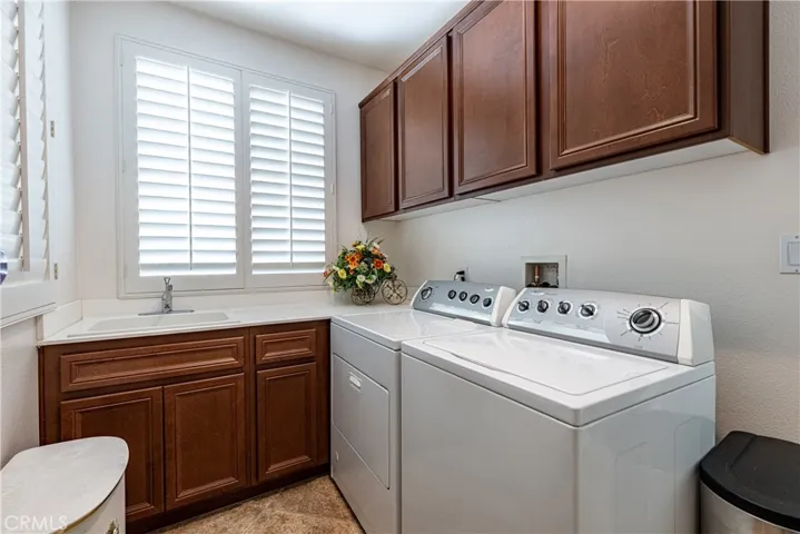 Indoor Laundry Room with sink