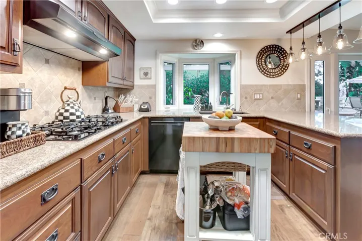 Upgraded Kitchen Cabinets and Counters. NOTE: Island is free-standing and can be removed.