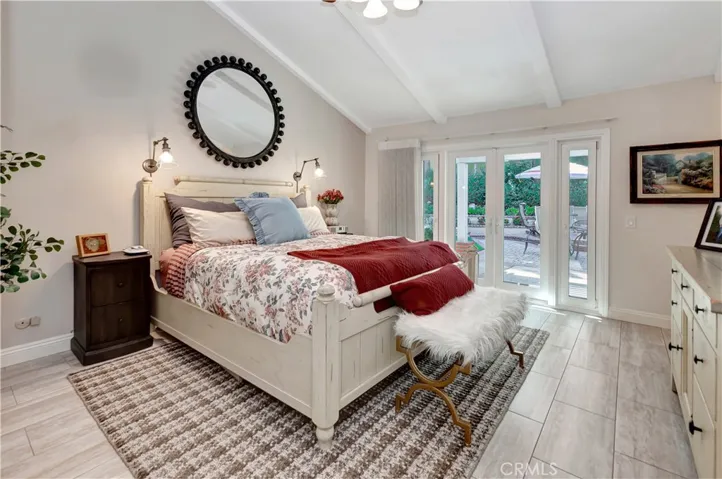 Primary Bedroom with Fantastic Lighting, Upgraded Windows/Doors, and Auto-Drapery Enclosure.