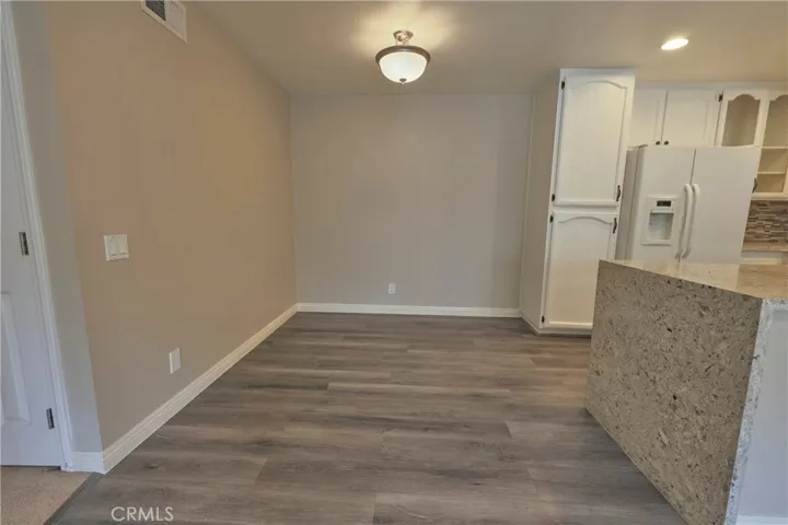 Updated vinyl flooring and quartz counters
