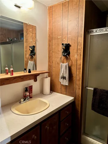 Guest bathroom has a new toilet and a walk-in shower