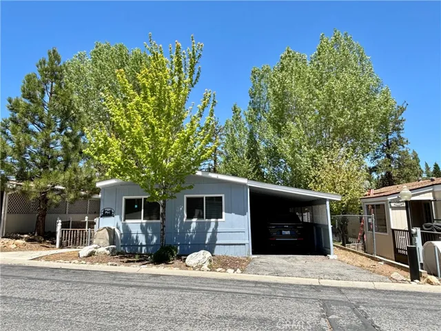 Front of home with carport