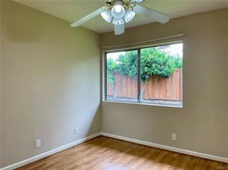 one of the second bedrooms with a  window looking outside