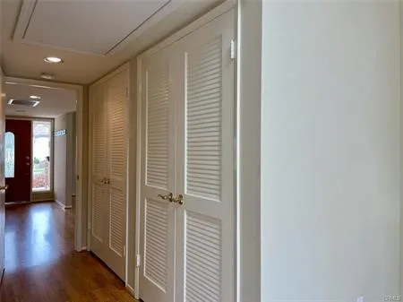Hallway from the Front door past the Master suite into the family room and 2 bedrooms. more closets in this hallway!!
