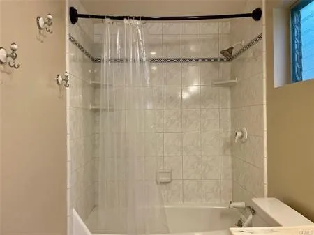 Second bathroom- full shower over the tub near the 2 back bedrooms.