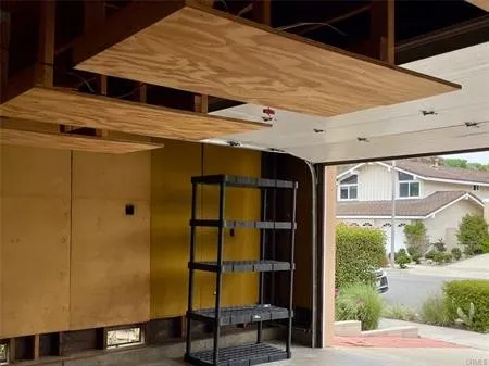 large 2 car garage with a driveway....