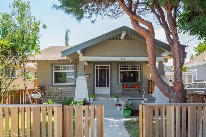 Fenced front yard, large covered porch