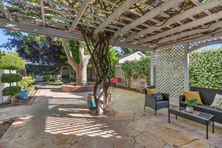 Trellis offers shade for entertaining, side gate access to driveway, sunny areas to relax