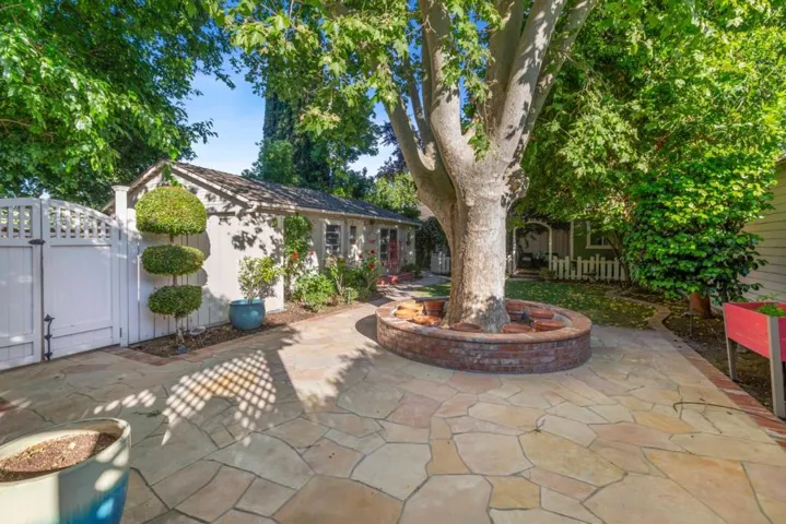 Detached 2 car garage has separate work shop area, has attached extra Office, workout room