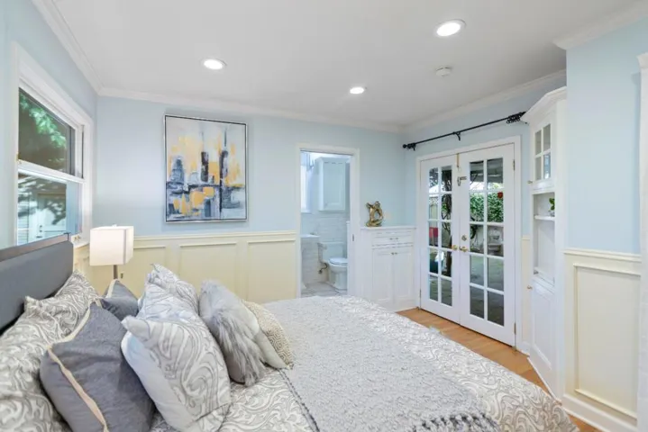 Main Bedroom with French doors to backyard