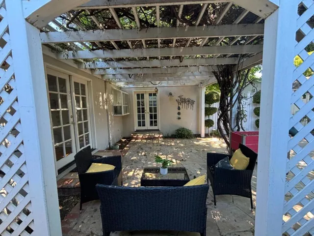 French doors from Main & 2nd bedroom access back yard