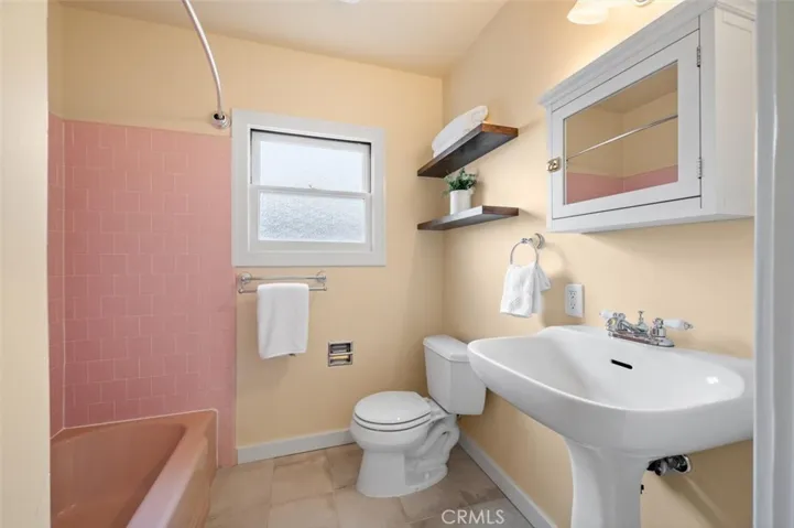 Main bath with tub & shower.