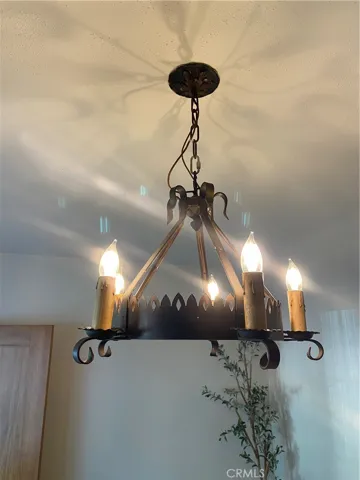 Original light fixture in dining room.