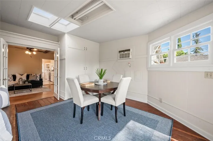 Enclosed patio opens to the den. Laundry in the cabinet.