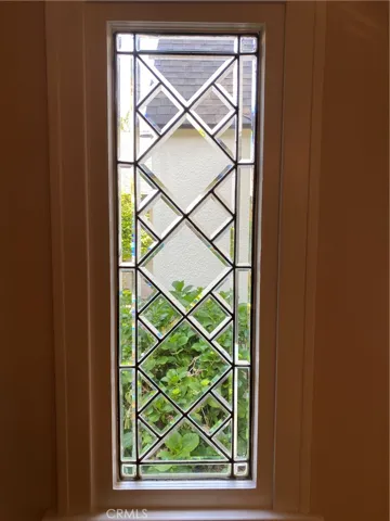 Leaded glass window in entry.