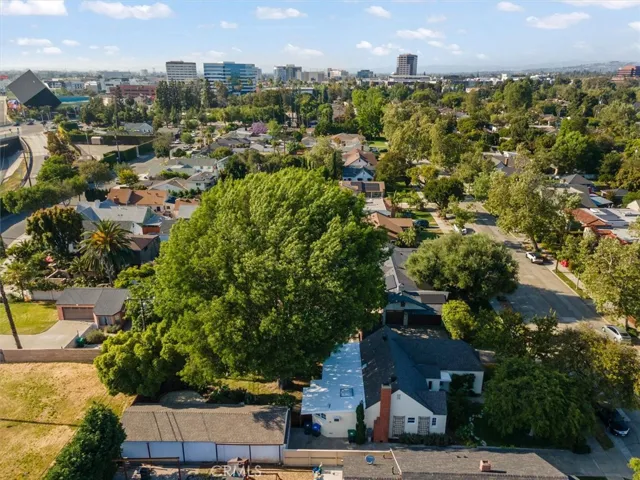 Vacant lot behind property is triangular and privately owned makes the back yard very private.