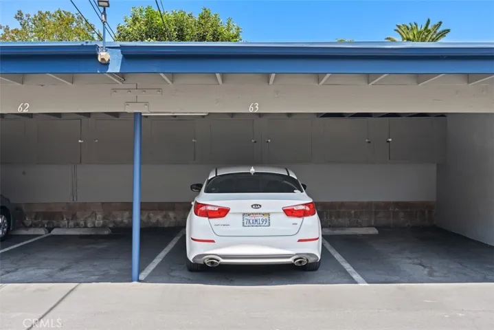 Assigned Car Port Stall with two Storage Cabinets