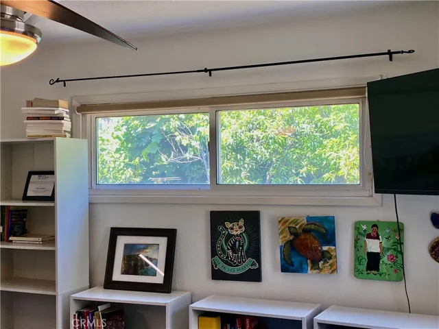 1st floor bedroom 1 with view to backyard fruit trees