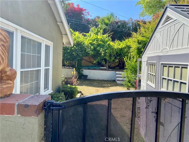 Gate to rear, off driveway near front porch