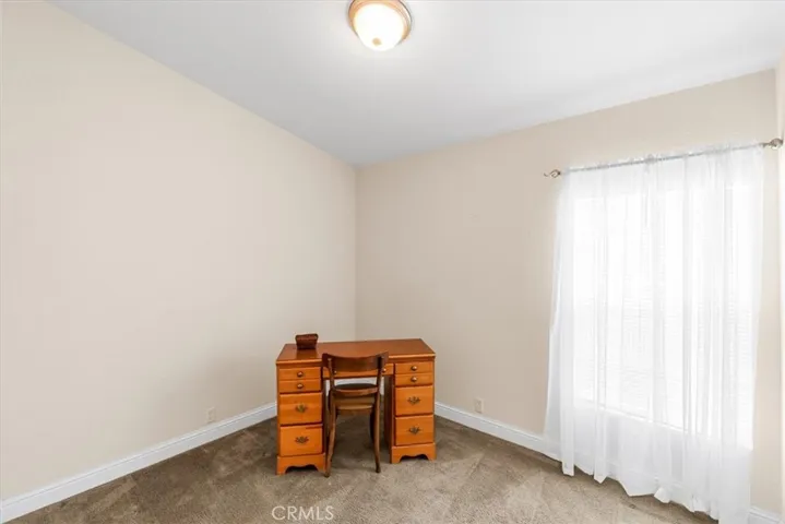 Bed 3. See AI staging of office.