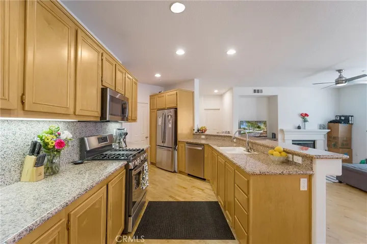 Plentiful maple cabinetry for an avid chef and bountiful storage!