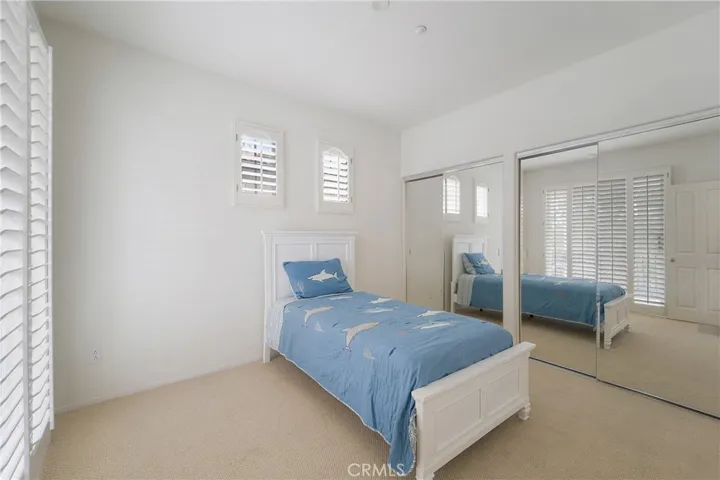 Secondary bedroom boasts a large closet.