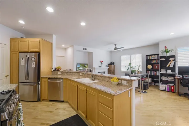 The newer refrigerator is included.