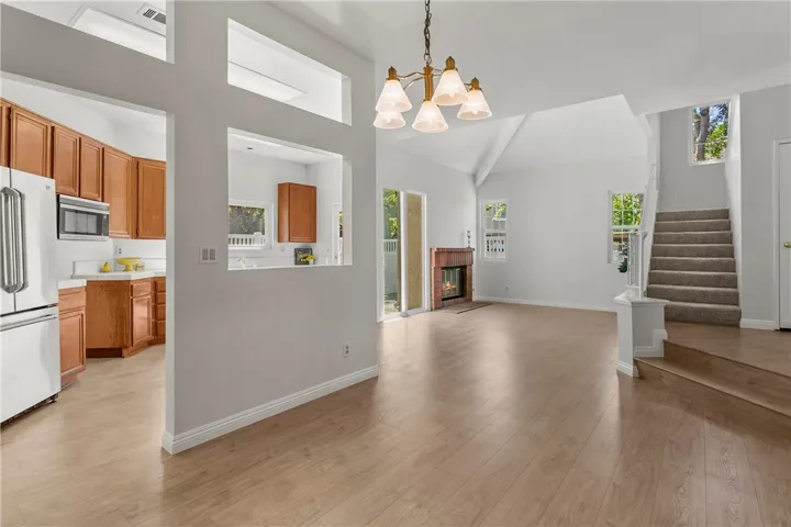 Dining Area facing Living Room and Stairs
