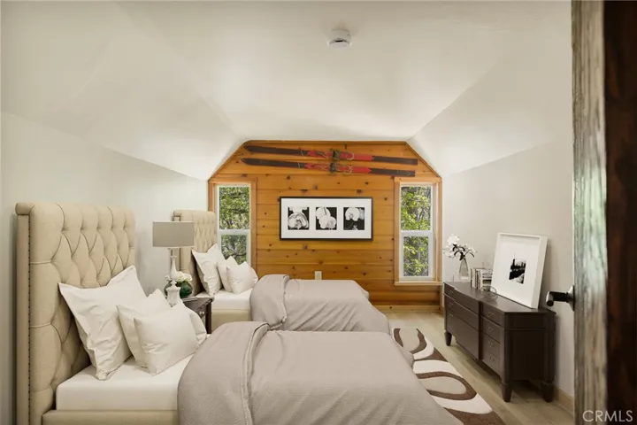 3rd bedroom has a view of the backyard.   NOTE: This photo has been virtually staged to offer a preview of furniture placement, providing an insightful perspective for arranging your living space.