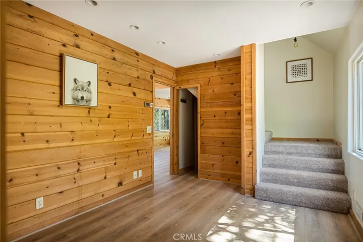 Another view of main level bedroom with closet.  Shown in its current view.