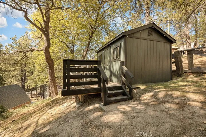 There is a large insulated shed with deck to enjoy the setting and tree views.