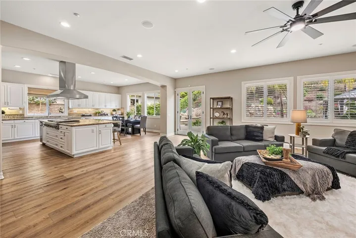 Wide Open Kitchen and Family room with Views of Rock pool and waterfalls