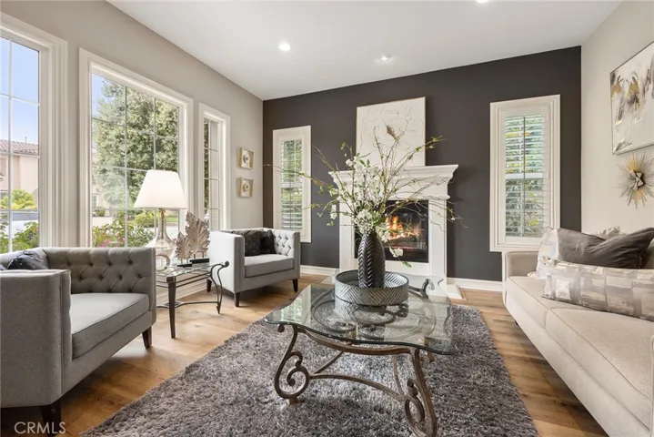Beautiful picture windows encasing the living room.