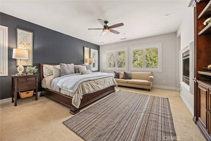 Primary Bedroom with doublesided fireplace
