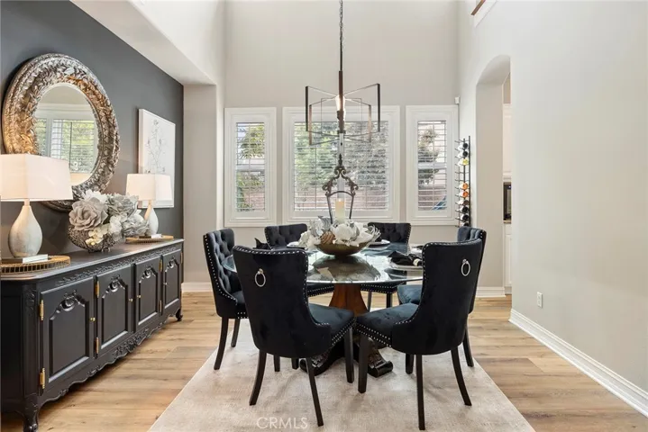Formal Dining room with 2 story ceilings.