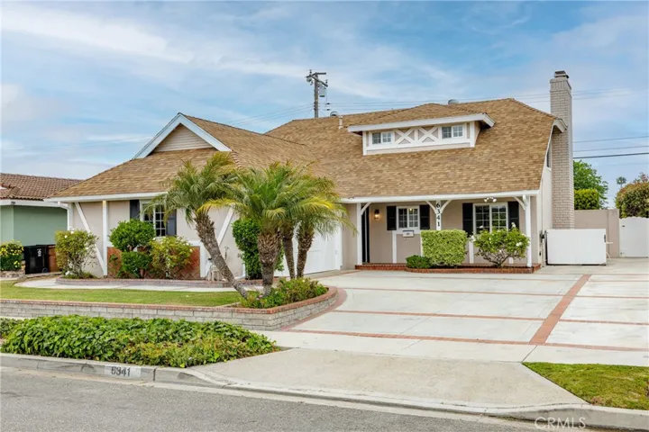 Front with large driveway
