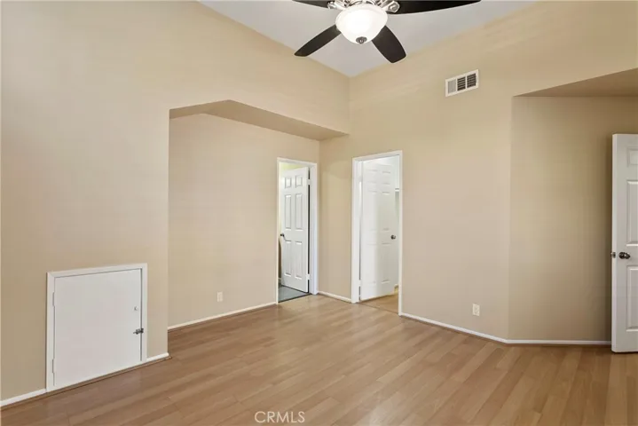 Primary Bedroom #2 - Up. Left door to bathroom, right door to walk-in closet, far right is entrance, small door is storage.