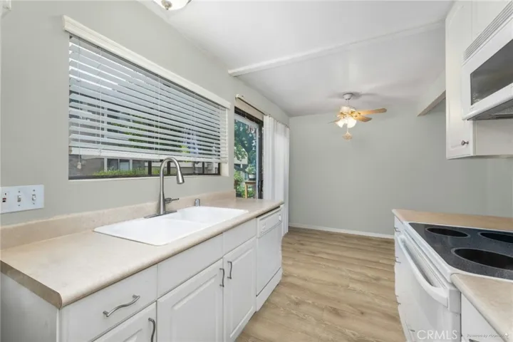 **Edited photo**Kitchen and breakfast reimagined with new flooring and paint*For reference only-home is occupied.