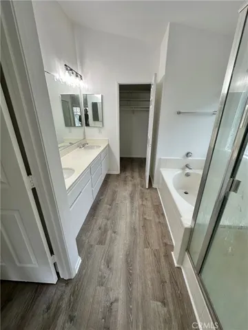 Master bath.  New flooring, freshly painted, new light fixtures.