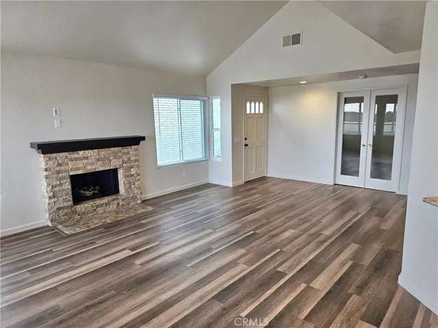 Living room with a cozy fireplace.