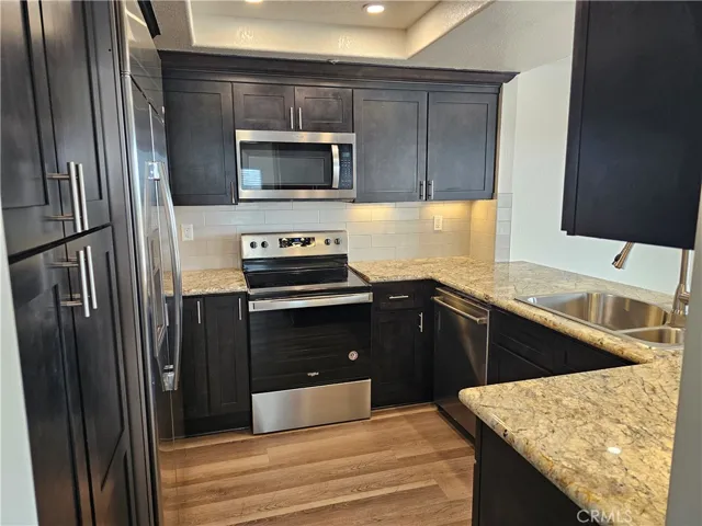 Updated kitchen with soft close doors and drawers.