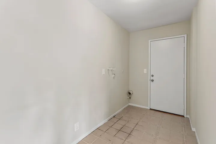 HUGE laundry room with access to side yard and garage