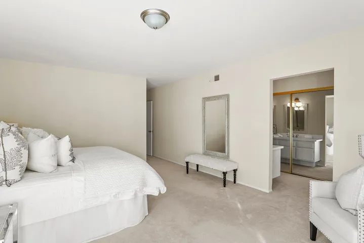 Primary entrance to ensuite vanities