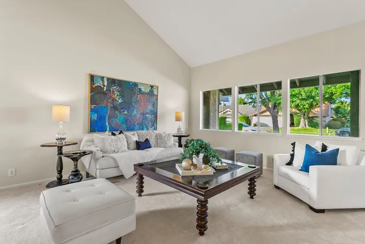 Large picture window would make a fantastic French Door to covered front patio.